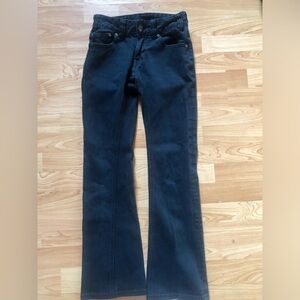Rock & Roll Cowgirl Size 24x32 dark wash mid rise boot cut jeans